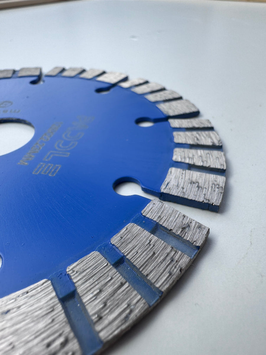 Diamond cutting blade cutting concrete with angle grinder for clean and precise masonry cuts