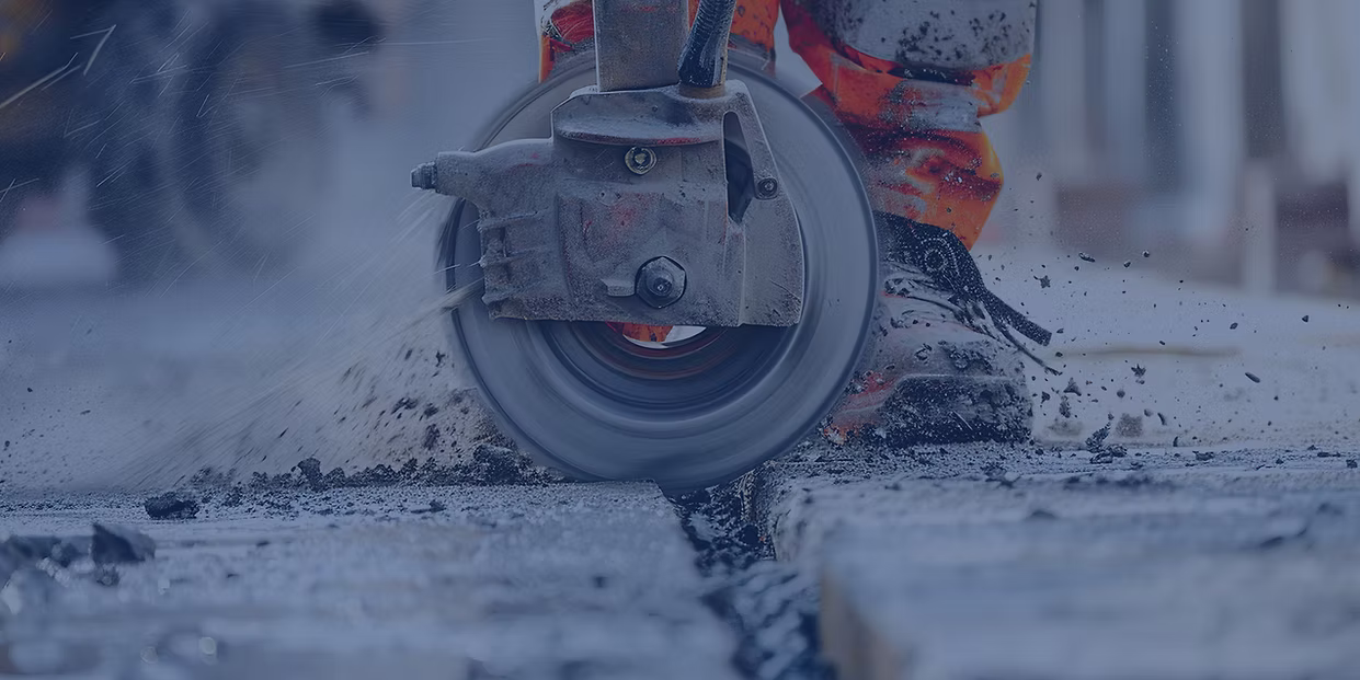 Contractor using diamond grinding tools on concrete — Paddle Wholesale Australia
