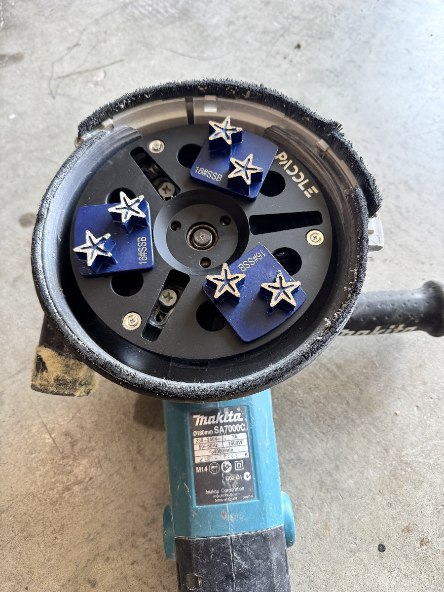 Redi Lock converter plate magnetic base showing 6 slot design for concrete grinding tools